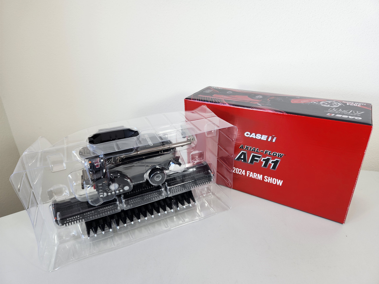 1:64 Case-IH AF11 Tracked Combine, '24 Farm Show Black Chase