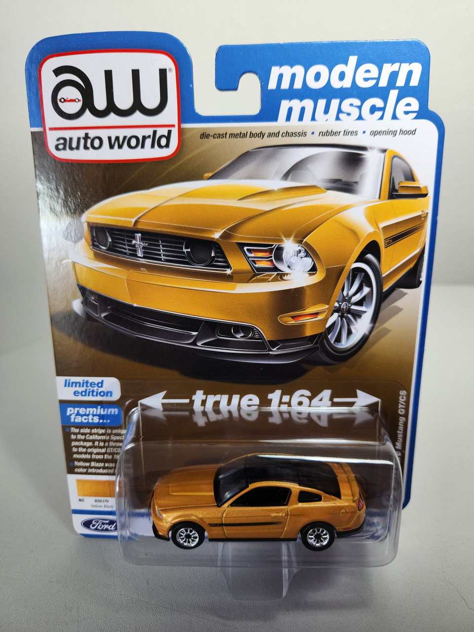 1:64 2012 Ford Mustang GT/CS, Yellow Blaze Tricoat by Auto World