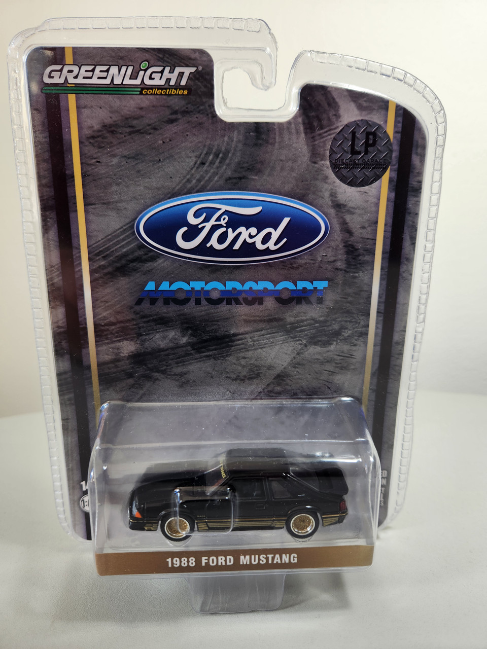 1:64 1988 Fox Body SLN Mustang, Black with Gold Stripe and Rims