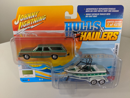 1:64 1973 Chevy Caprice Light Green with Boat & Trailer by Johnny Lightning