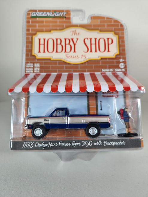 1:64 The Hobby Shop Series 15 - 1993 Dodge Power Ram 250 with Backpacker by GreenLight