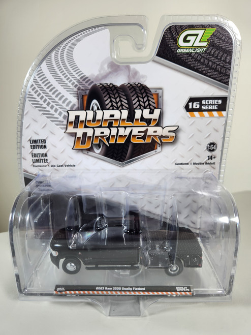 1:64 Dually Drivers Series 16 - 2023 Ram 3500 Dually Flatbed - Black