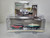 1:64 Hitch & Tow Series 23 - 2021 Ford Bronco Wildtrak in Rapid Red Metallic with Boat Trailer