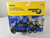 1:64 New Holland Midnight Blue Puller Tractor with Blue Sled by Ertl