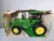 1:16 John Deere 4850 Tractor with Duals, FWA and Cab, New Orleans Dealer Intro Edition by Ertl