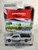 1:64 Showroom Floor Series 4 - 2023 Ram 3500 Limited Longhorn - Billet Silver Metallic and Walnut Brown Metallic  Green Machine