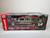 1:18 1959 Cadillac Eldorado Hearse Apple Red, Rat Fink by Auto World