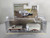 1:64 Hitch & Tow Series 30 - 1991 Ford F-250 XLT Lariat with Livestock Trailer - Colonial White & Desert Tan Metallic