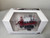 1:64 Unverferth NutriMax 2600 Applicator with Tracks, Red by SpecCast