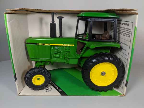 1:16 John Deere Row Crop Tractor with FWA and Cab by Ertl