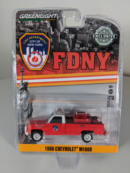 1:64 1986 Chevrolet M1008 4x4 - FDNY (The Official Fire Department City of New York) with Fire Equipment, Hose and Tank (Hobby Exclusive)