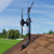 Lifestyle image of the ClearStream 2V antenna on mast on roof of house - SIDE VIEW