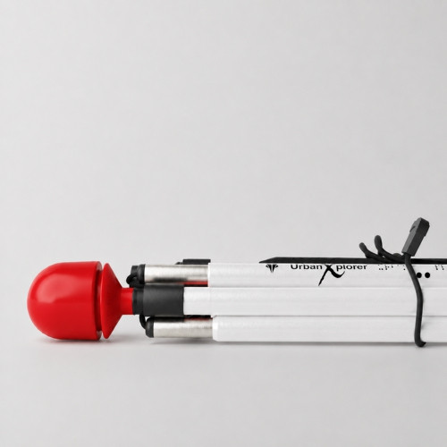 Folded Awarewolf Gear Urban Xplorer mobility cane featuring a Trail Red hook-style dome tip on a white background.