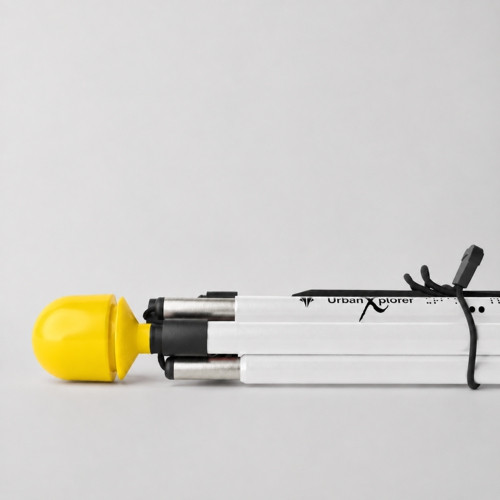 Folded Awarewolf Gear Urban Xplorer mobility cane featuring a Hello Yellow hook-style dome tip on a white background.
