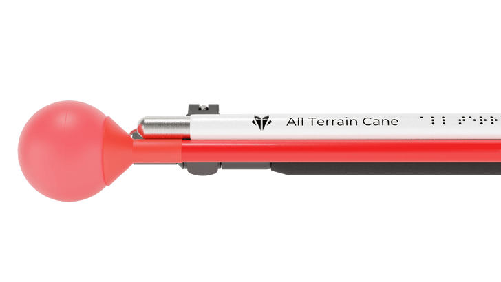 Introducing the 5th Generation All Terrain Cane by Awarewolf Gear. Strength, Outdoorsmanship, Empowerment, Freedom, Confidence, and ultimate mobility. All Terrain Cane featured in its folded position and photographed with a red roller ball tip. Macro lens close up of the Trail Red Roller Ball Tip and folded sections.