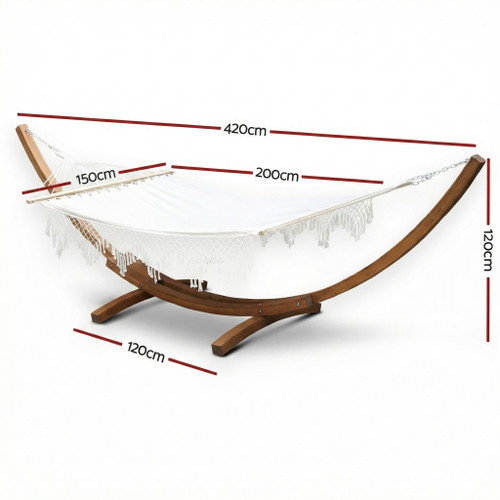 The Larchwood Serenity E1 boho double timber hammock with cream tassels and curved larch wood stand
