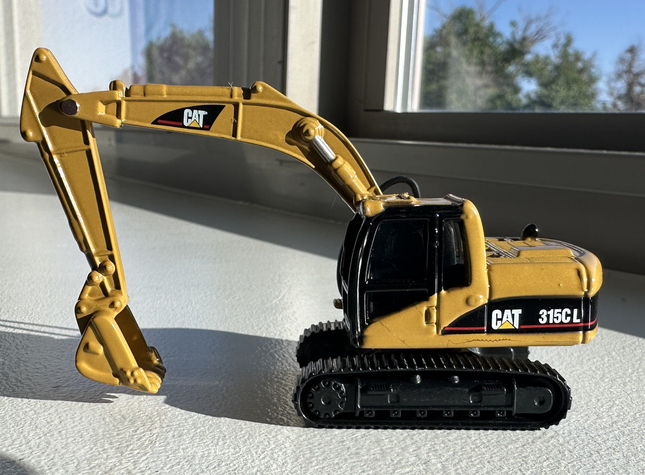 HO 1:87 Diecast Masters 84400 Cat 315C L Hydraulic Excavator