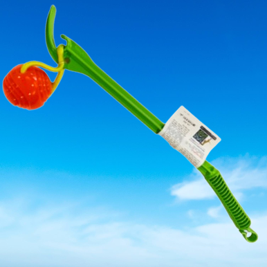 Back Details: USA-made Green Launcher & Orange Ball Set. Focuses on eco-friendly materials and easy-grip design, perfect for active dogs and owners seeking a sustainable play option.