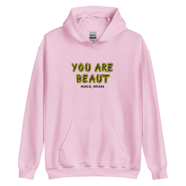 A mockup of the You are Beaut Graffiti Hoodie