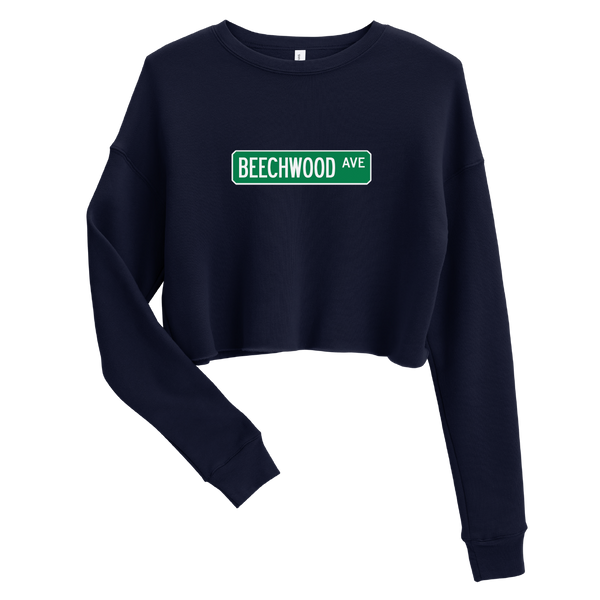 A mockup of the Beechwood Ave Street Sign Muncie Ladies Cropped Crewneck