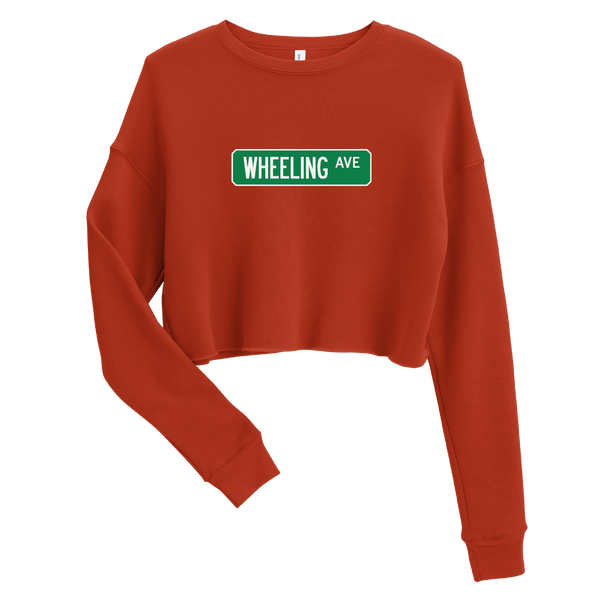 A mockup of the Wheeling Ave Street Sign Muncie Ladies Cropped Crewneck