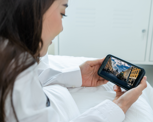 Woman viewing course on mobile phone