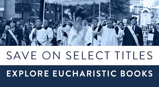Priest walking during Eucharistic Congress in Charlotte