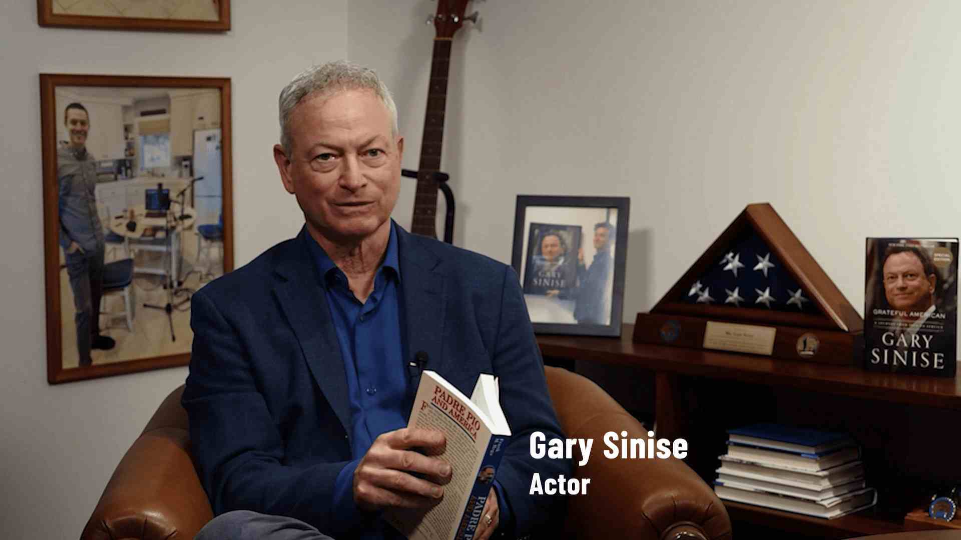 Actor Gary Sinise reading Padre Pio in America book