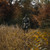 hunter walking in a field
