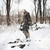 hunter wearing revenant walking in the woods