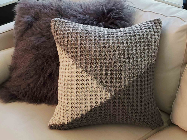 Hygge North Star Knit Pillow on Sofa