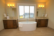 Homeowners Incorporating Freestanding Tubs Into Master Bathroom Designs For A More Spa-Like Atmosphere  