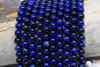 Tiger Eye A Grade Dyed Dark Blue Polished 8mm Round