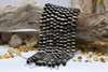 Tibetan Beige and Black Agate Polished 10mm Faceted Round