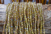 Glass Crystal Polished 3x4mm Faceted Rondelle - Amber AB Half Plated