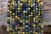 Tiger Eye A Grade Dyed Blue Yellow Polished 6mm Round