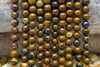 Yellow Tiger Iron Polished 8mm Round
