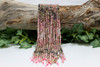 Rhodonite Polished 4mm Faceted Round - Banded