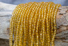 Glass Crystal Polished 4mm Faceted Round - Light Yellow Topaz