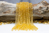 Glass Crystal Polished 7mm Faceted Round - Light Yellow Topaz