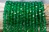 Glass Crystal Polished 7mm Faceted Round - Transparent Emerald Green