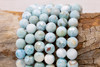 Larimar Polished 10mm Faceted Round