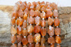 Sunstone Polished 6-12mm Faceted Nugget
