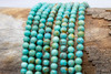 Kingman Turquoise Stabilized Polished 4mm Round - Arizona