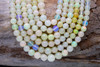 Ethiopian Opal Polished Cream 3-5mm Graduated Round