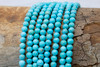 Kingman Turquoise Stabilized Polished Blue 4mm Round - Arizona