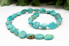 Natural Turquoise Polished 11mm Free Form Coin - China