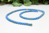 Reconstructed Manmade Turquoise & Shell 4mm Round - Sky Blue