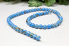 Reconstructed Manmade Turquoise & Shell 6mm Round - Sky Blue