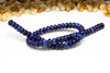 Impression Jasper Polished 6x10mm Rondelle - Dark Blue